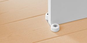 Tope Inofix 2058 con retenedor giratorio, base metálica y fijación adhesiva, disponibles en blanco, marrón y beige, para puertas de hasta 45 mm