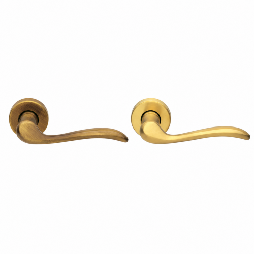 Manilla para puerta Manital TOSCA con roseta redonda en acabados bronce envejecido y latón satinado, diseño italiano elegante de líneas curvas para puertas de interior modernas y clásicas.